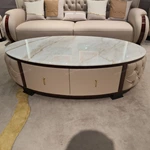 Oval White Marble Coffee Table with Cream Tufted Leather Sides and Two Drawers